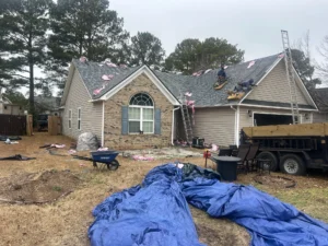 Contractor discussing roofing estimates with homeowner, focusing on Fayetteville NC context