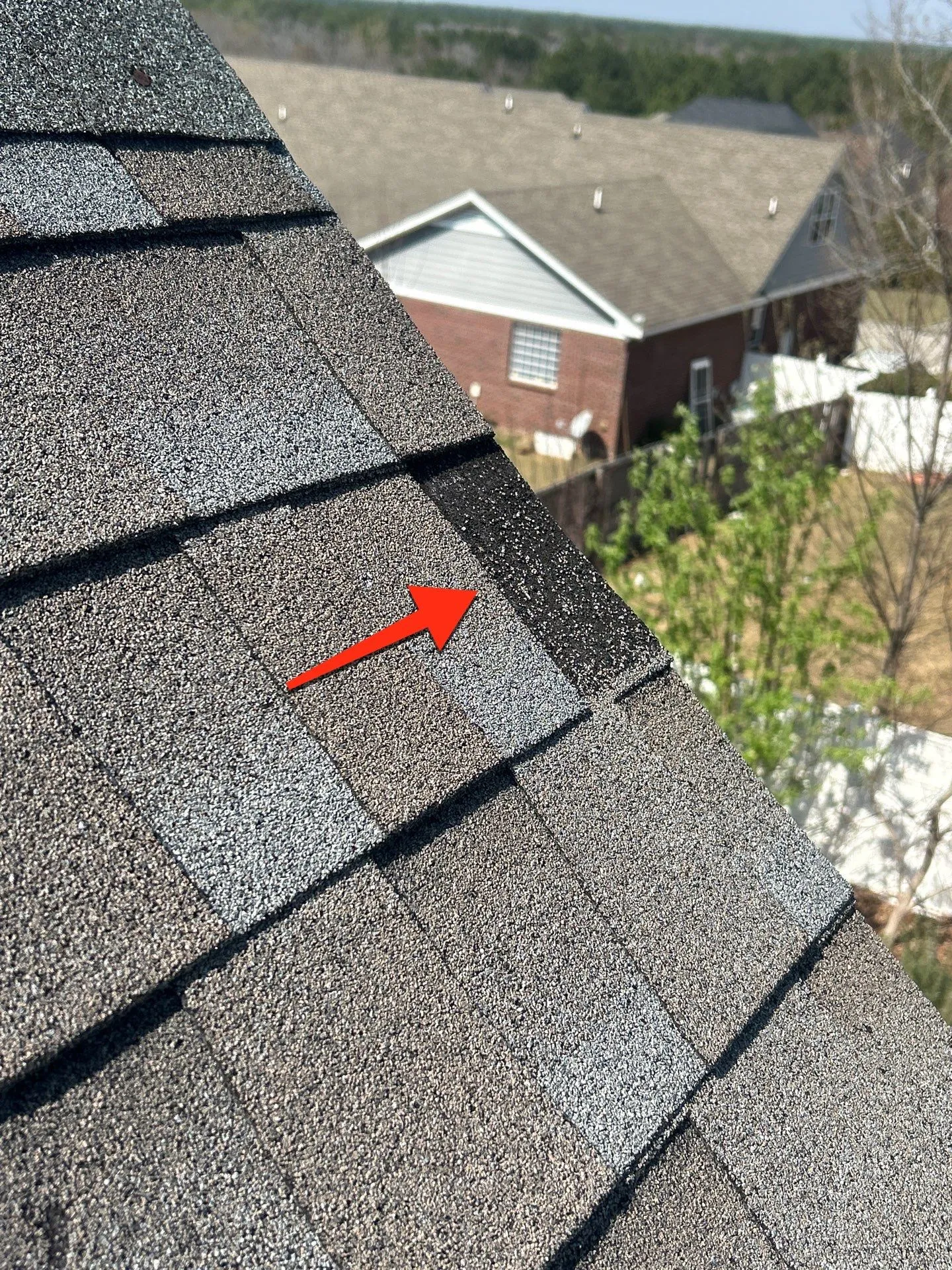 Variety of roofing materials including asphalt shingles, metal, and tile ideal for Fayetteville NC climate